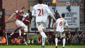 Andy Carroll towers above Liverpool to seal points for West Ham