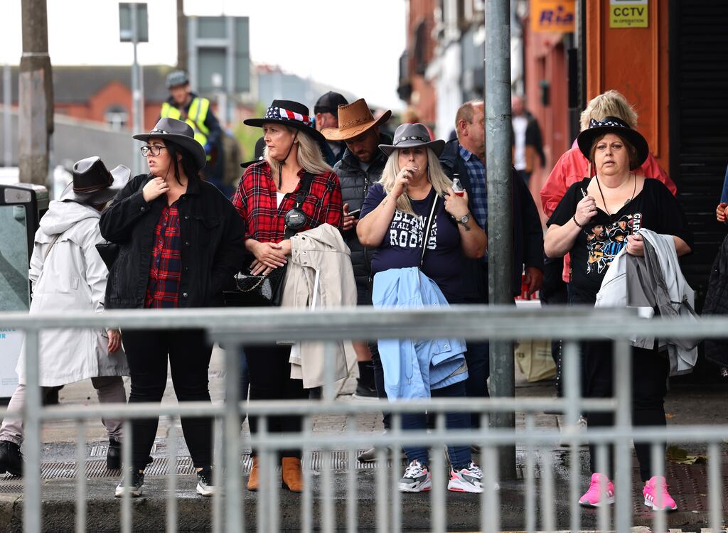 Garth Brooks fans make their way to the concert in Croke Park on Sunday. The singer’s three concerts over the weekend were his first in Dublin for 25 years. Photograph: Dara Mac Dónaill