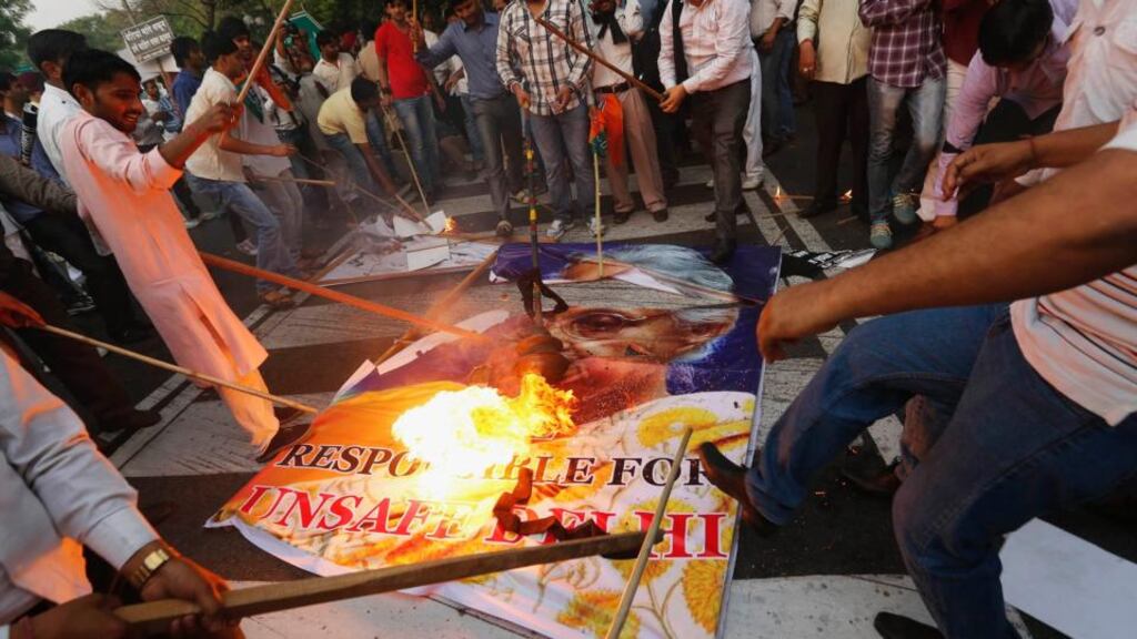 Supporters of India’s main opposition Bharatiya Janata Party (BJP) burn a picture of Delhi’s Chief Minister Sheila Dixit during a protest outside her residence in New Delhi earlier this month following the rape of a five year old girl in the city. Photograph: Adnan Abidi/Reuters