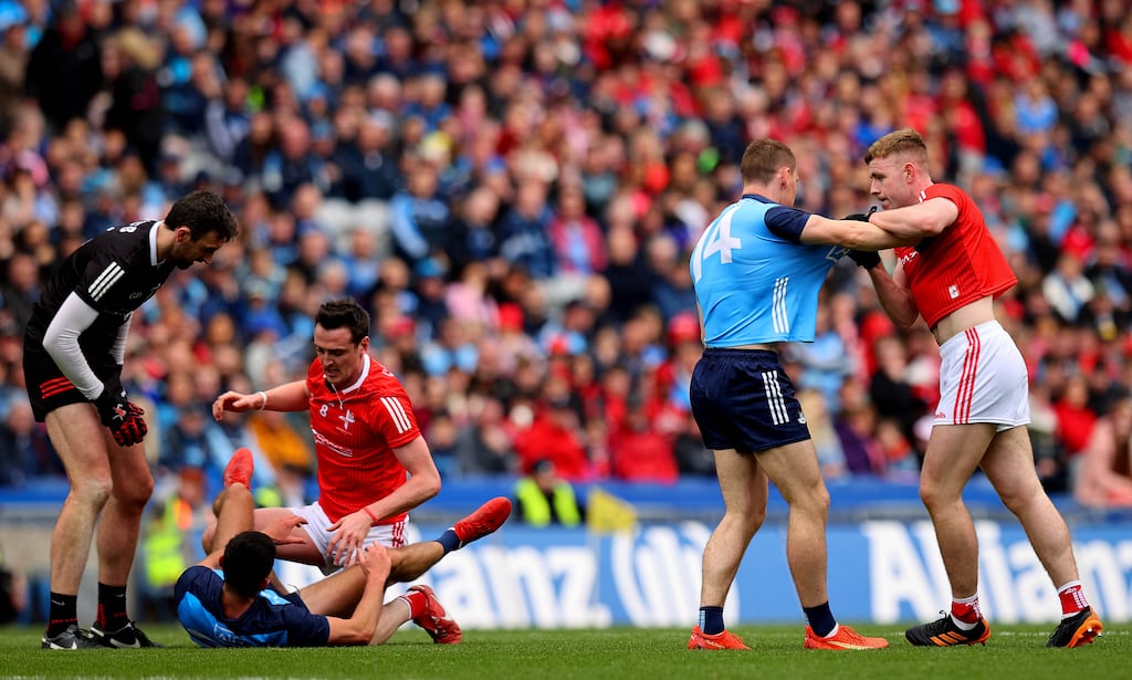 Dublin’s Con O’Callaghan and Peter Lynch of Louth in the Leinster GAA Senior Football Championship final at Croke Park on Sunday. Photograph: Ryan Byrne/Inpho