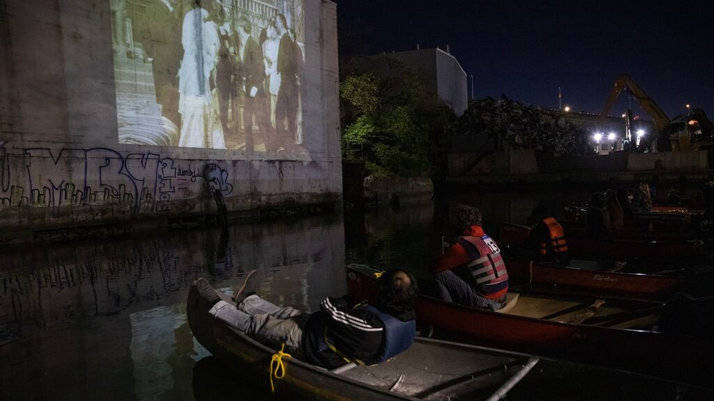 Canal plus film: Attendees in canoes at the Gowanus Dredgers paddle-in movie in Brooklyn, New York, on September 19th. Photograph: Paul Frangipane/Bloomberg