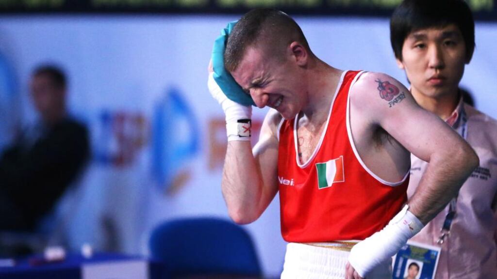 Ireland’s Paddy Barnes after his defeat to Jasurbek Latipov of Uzbekistan in Almaty. Photograph: Cathal Noonan/Inpho