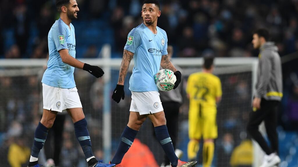 Manchester City’s Brazilian striker Gabriel Jesus leaves the pitch with the match ball. Photograph: Getty Images