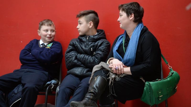 Keith and Leon of Larkin Community Colege with Sarah Fitzgibbon from the Abbey Theatre. Photograph: Dara Mac Dónaill
