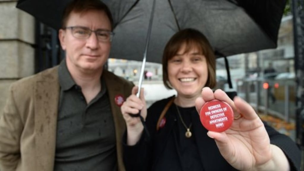 Andrew Prior and Kath Cottier from the Construction Defects Alliance outside Leinster House. Photograph: Dara Mac Dónaill/The Irish Times