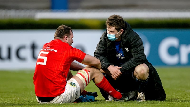 Luke McGrath consoles Tadhg Beirne after Leinster’s Pro14 final win over Munster. Photograph: Billy Stickland/Inpho