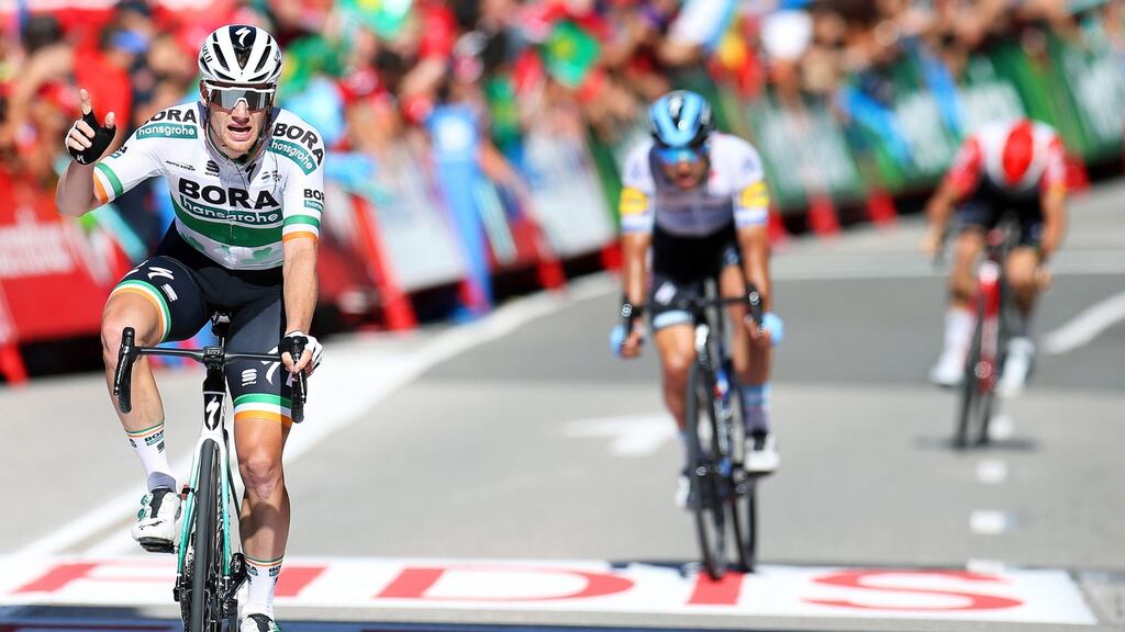 Irish rider Sam Bennett of the Bora hansgrohe team reacts crosses the finish line to win the 14th stage of the Vuelta a Espana. Photograph: EPA