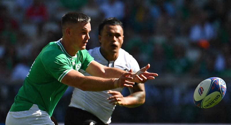 Ireland outhalf Johnny Sexton passes the ball during the Rugby World Cup game against Romania at Stade de Bordeaux. Photograph: Christophe Archambault/AFP via Getty Images