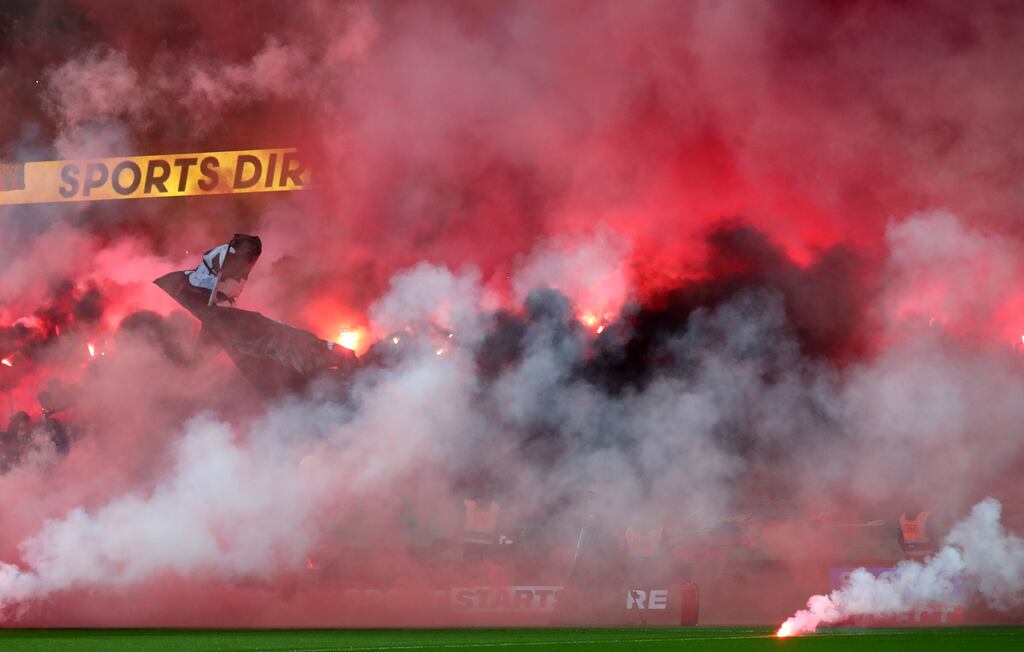 Fans set off flares ahead of the FAI Cup final. Photograph: Bryan Keane/Inpho