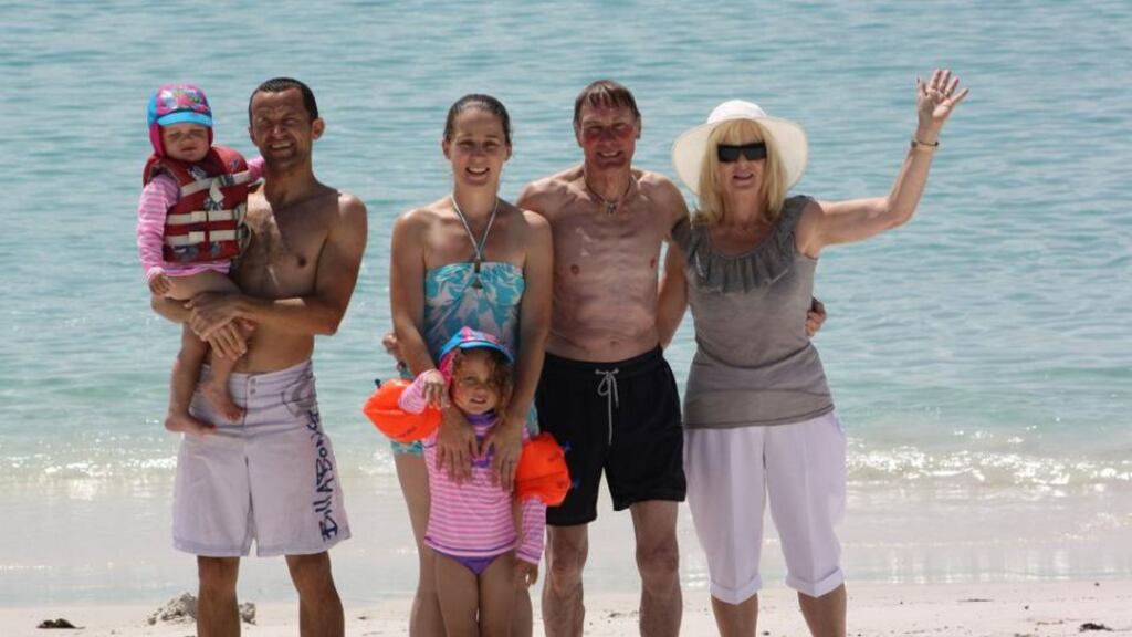 James Parnell (left) with his wife Anne-Marie, father-in-law Oliver, mother-in-law Liz and two children in Sydney.