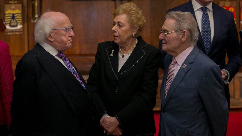 President Michael D Higgins speaks to Irish Holocaust survivors Suzi Diamond and Tomi Reichenthal Photograph: Gareth Chaney/Collins