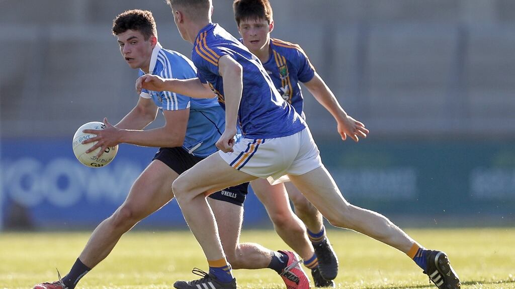 Electric Ireland Leinster Minor Football Championship: Dublin’s Eoin Adamson with Kevin Quinn and John Keogh of Wicklow. Photograph: ©INPHO/Laszlo Geczo