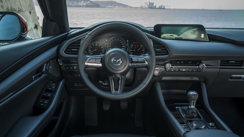 High-end: slip into the cabin of the Mazda 3 and feel the way the high-backed seats hold you in an ergonomically ideal position. Feel the perfectly judged width of the steering wheel rim, the silky smoothness of the switch actions, the tactility of the materials