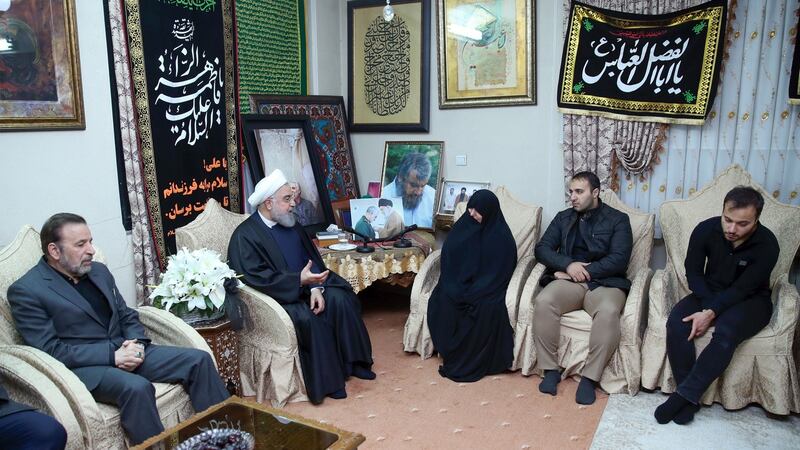 President Hassan Rouhani offering his condolences to the family of killed Iranian Revolutionary Guards commander Qassem Suleimani. Photograph: Iranian Presidency/AFP/ Getty Images