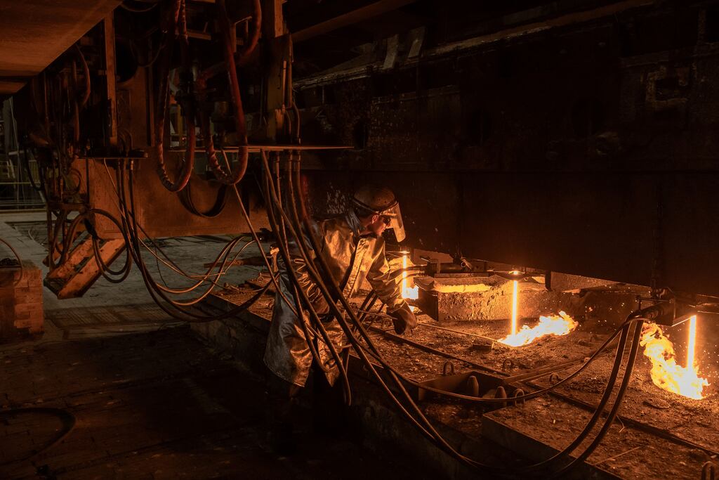 An employee at work at the ArcelorMittal steel plant, in Kryvyi Rig, southern Ukraine. Photograph: ROMAN PILIPEY/AFP via Getty Images