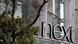 Next cautious on UK economy as annual profit jumps