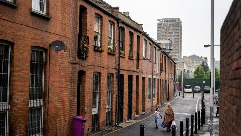 A street in the Bethnal Green district, home to a deeply conservative Muslim community, in London. Photograph: Andrew Testa/The New York Times