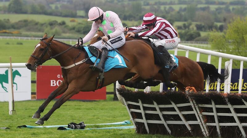 Ruby Walsh on board Bapaume clears the last to win the AES Champion Four Year Old Hurdle at Punchestown. Photograph: Lorraine O’Sullivan/Inpho