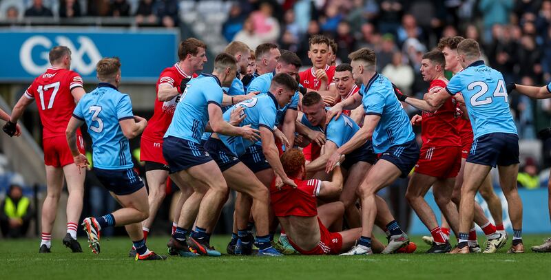 Derry’s Conor Glass and Paddy Small of Dublin clash. Photograph: James Crombie/Inpho