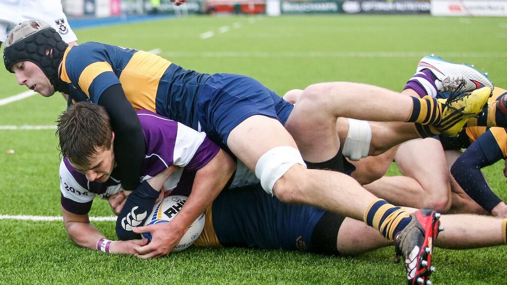 Clongowes’ Miles O’Connor scores a try. Photograph: Gary Carr/Inpho