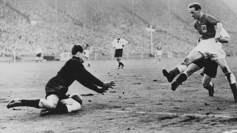 Tom Finney in action for England against West Germany at Wembley Stadium in 1954. Photograph: Hulton Archive/Getty Images