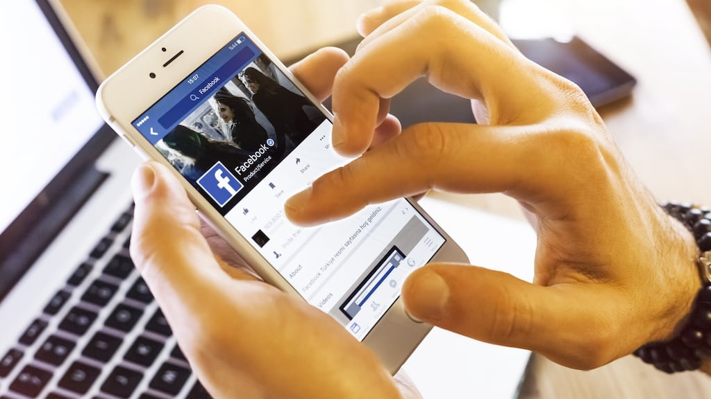 Facebook said it would make it easier for people to report suspected fake news and would work with fact-checking organisations