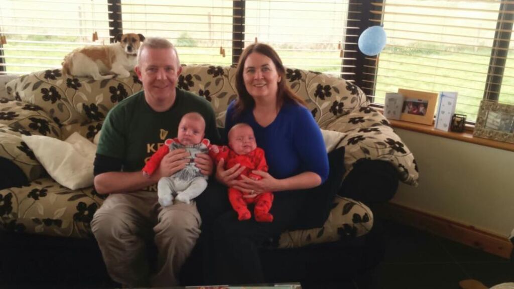 Liz and Sean Farrell with their baby boys, Oisín and Conor.