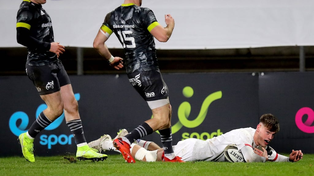 Ulster’s Ethan McIlroy scores his side’s second try of the game during the win over Munster. Photo: Ryan Byrne/Inpho
