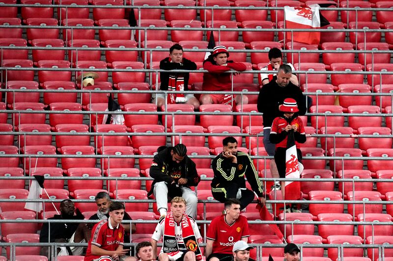 Manchester United fans following the defeat to Spurs. Photograph: Nick Potts/PA Wire