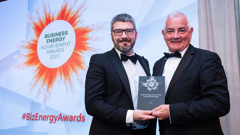 Conall Bolger, awards judge, presents the best energy achievement in food and beverage award to John Durkan, ABP