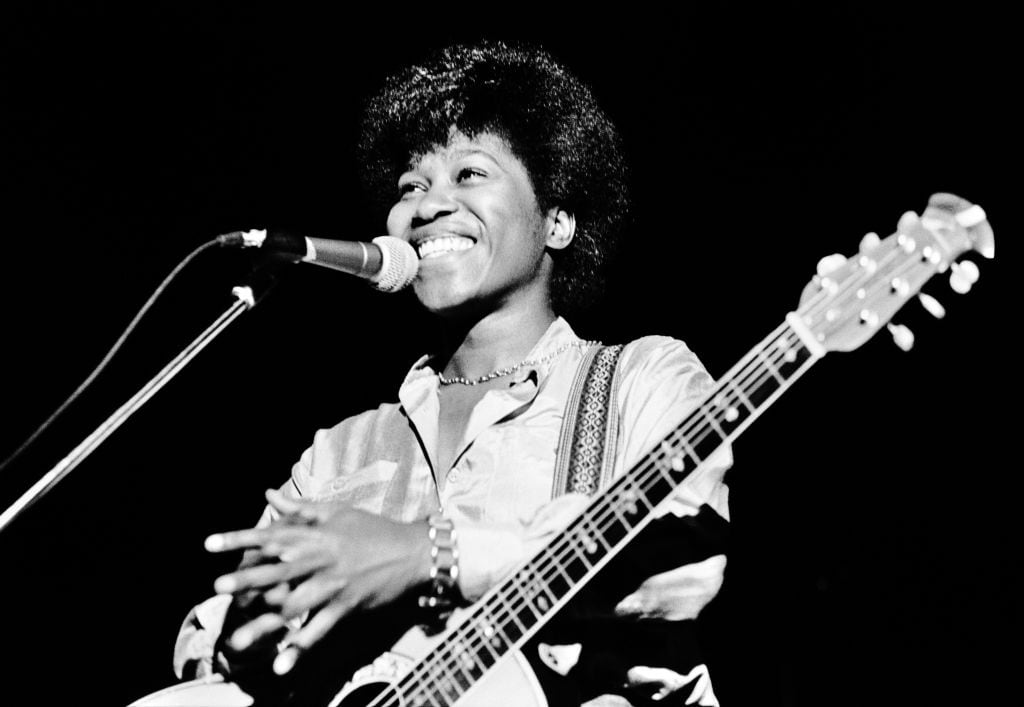 Joan Armatrading performing on stage in 1976. Photograph: Gus Stewart/Redferns/Getty Images