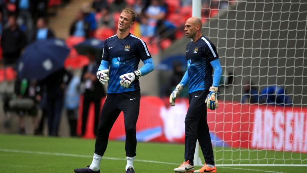 Manchester City goalkeeper Joe Hart warms up with team-mate Willy Caballero prior to Sunday’s Community Shield match at Wembley Stadium. Photograph: PA