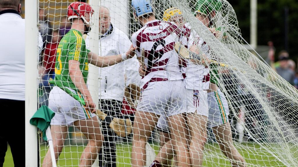 Players from both teams scuffle at Owenbeg. Photograph: Evan Logan/Inpho