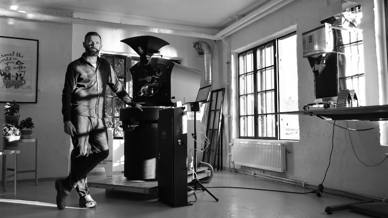 ‘We want to roast coffee in a socially and environmentally responsible way.’ Jack Ryan roasting coffee in Stockholm. Photograph: Niklas Magnusson