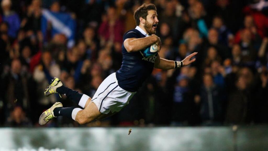Scotland’s Tommy Seymour scores a try against Argentina during the match at Murrayfield. Photograph: Russell Cheyne/Reuters