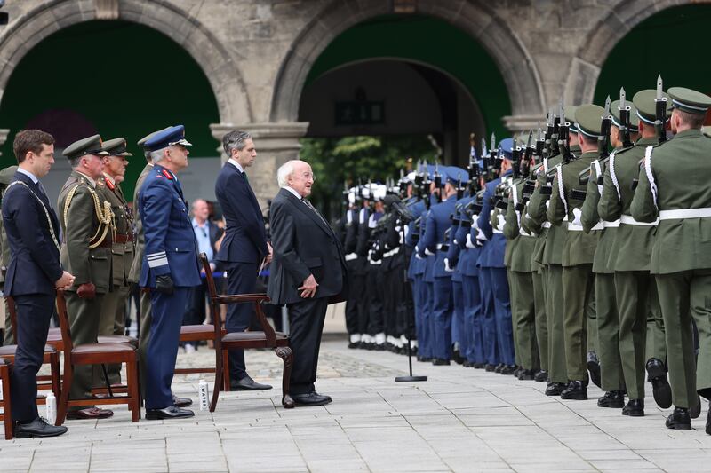 President Michael D Higgins and Taoiseach Simon Harris at the ceremony with members of the Defence Forces. Photograph: Dara Mac Dónaill/The Irish Times