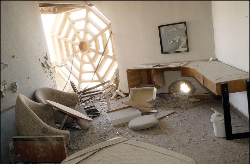 2DDB3FW NO FILM, NO VIDEO, NO TV, NO DOCUMENTARY - © Chip Somodevilla/KRT/ABACA. 52971-4. Baghdad-Iraq, November 21, 2003. A rocket attack left a two holes in the wall of room 1531 in the Palestine Hotel, a popular hotel for foreign journalists and business people, Friday morning, November 21, 2003, in do