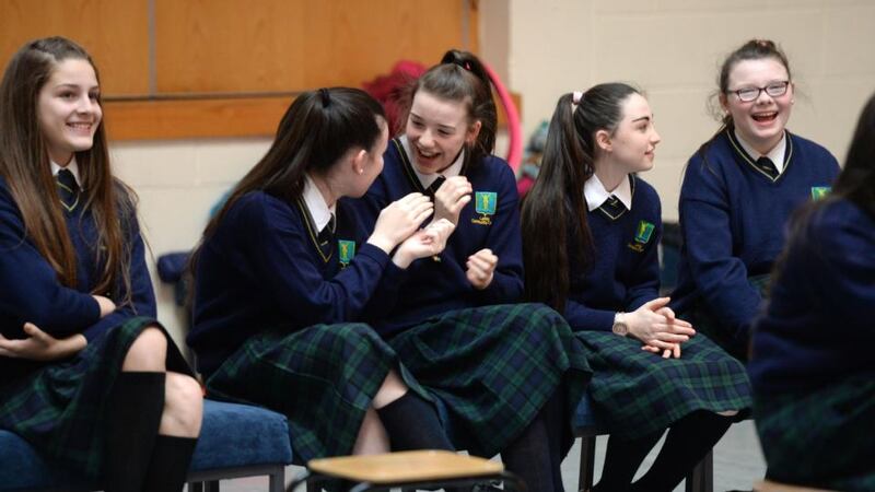 Larkin College students look on during rehearsals. Photograph: Dara Mac Dónaill