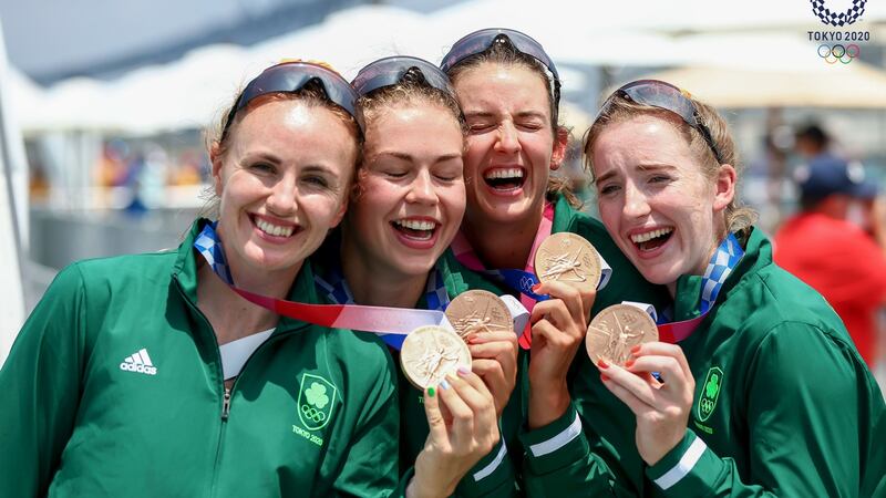 Aifric Keogh, Eimear Lambe, Fiona Murtagh and Emily Hegarty celebrate with their bronze medals from rowing. Photograph: Morgan Treacy/Inpho