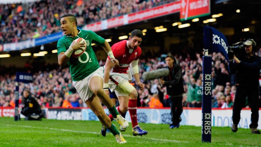 Wing Simon Zebo runs in the first try during Ireland’s opening  Six Nations game against  Wales last year  at the Millennium Stadium in Cardiff. Photograph: Stu Forster/Getty Images