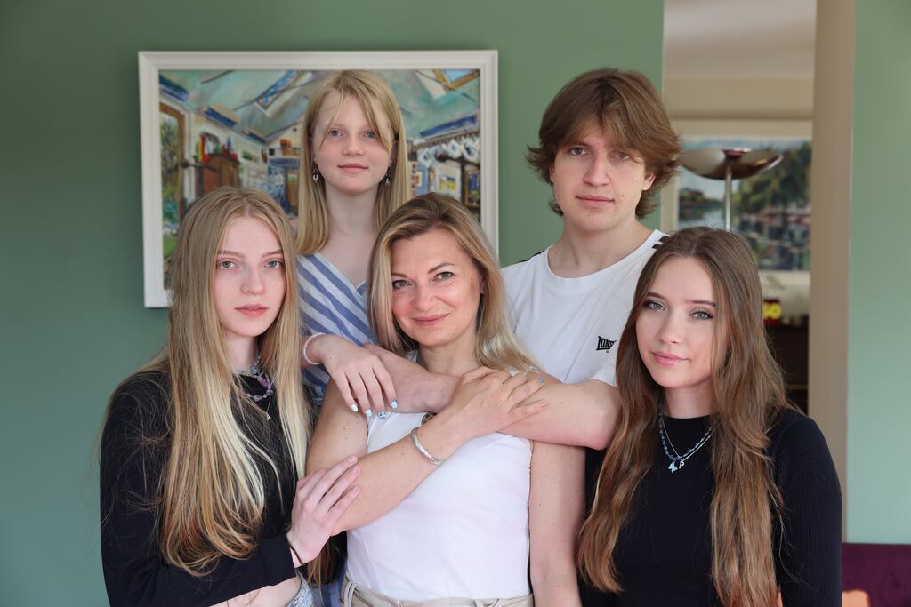 New to the Parish: Olena Domina with her daughters, Polina and Angel, her son, Zhenya, and (right) Polina's best friend, Nastya Barbul, who also recently moved to Ireland from Ukraine. Photograph: Dara Mac Dónaill