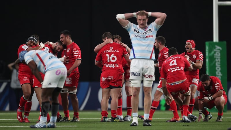 Toulouse celebrate their win over Racing 92 in Paris. Photograph: Billy Stickland/Inpho