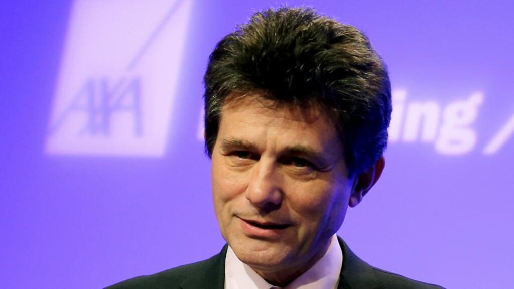 Henri de Castries, chief executive of Axa, speaks prior to the company’s 2013 results presentation at their Paris headquarters yesterday. Photograph: Reuters