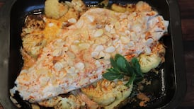 Baked hake, cauliflower, almond, harissa and orange dressing