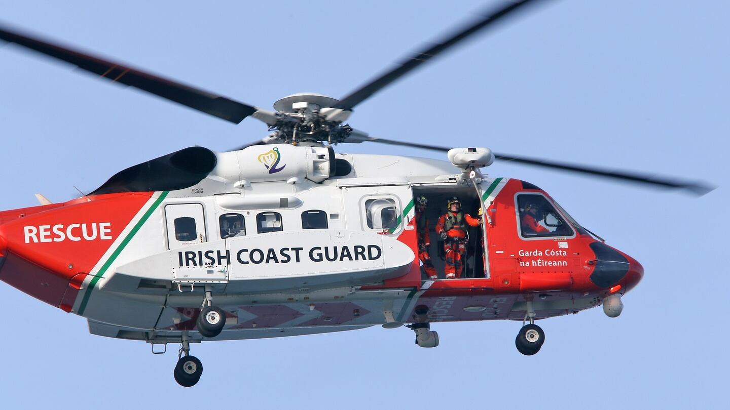 Coast Guard helicopter conducts visual searches along the coastline around Blacksod. Photograph: Colin Keegan/Collins
