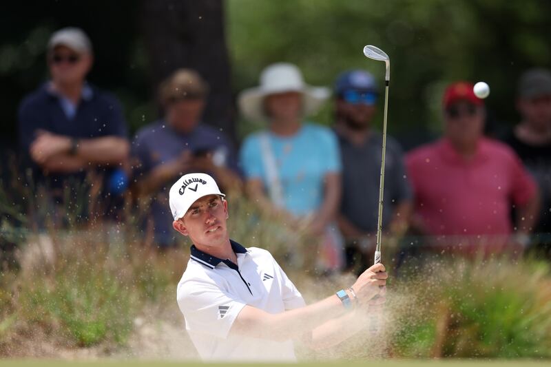 PINEHURST, NORTH CAROLINA - JUNE 11: Tom McKibbin of Northern Ireland plays a shot from a bunker on the sixth hole during a practice round prior to the U.S. Open at Pinehurst Resort on June 11, 2024 in Pinehurst, North Carolina. (Photo by Gregory Shamus/Getty Images)