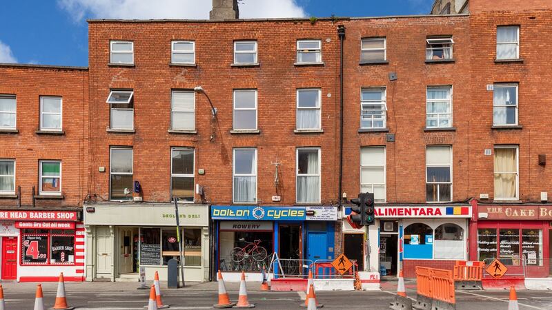 This 293sq m, four-storey Georgian, on Bolton Street, Dublin 1,  has a bike shop at ground level paying €24,000 annually. Upstairs is a six-bed house.