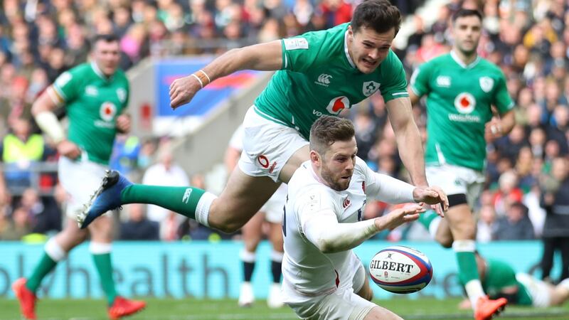 England’s Elliot Daly beats Jacob Stockdale of Ireland to the ball to score his team’s second try during the 2020 Guinness Six Nations match at Twickenham. Photograph: Warren Little/Getty Images