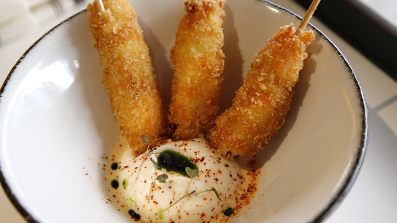 Fried Dublin Bay prawns, garlic toum, bisque and dill