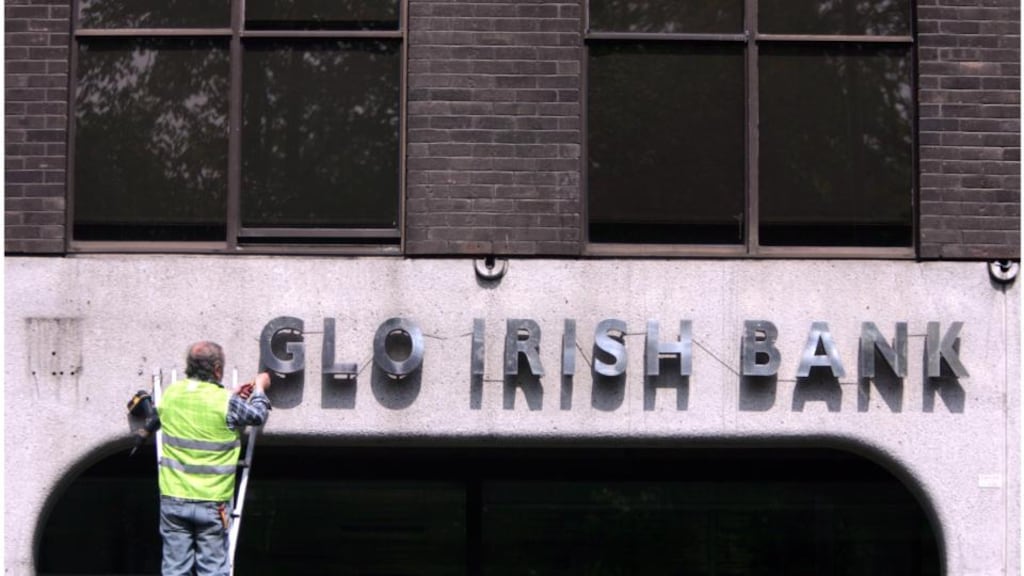 Anglo Irish Bank signage and lettering being removed from the Anglo Irish Bank headquarters Office on St Stephen’s Green in Dublin.